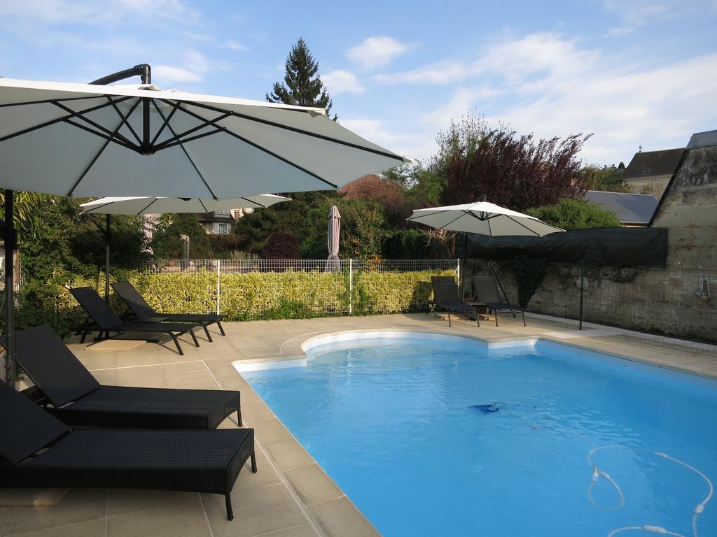 Logis Hotel De France La Chartre-sur-le-Loir Esterno foto