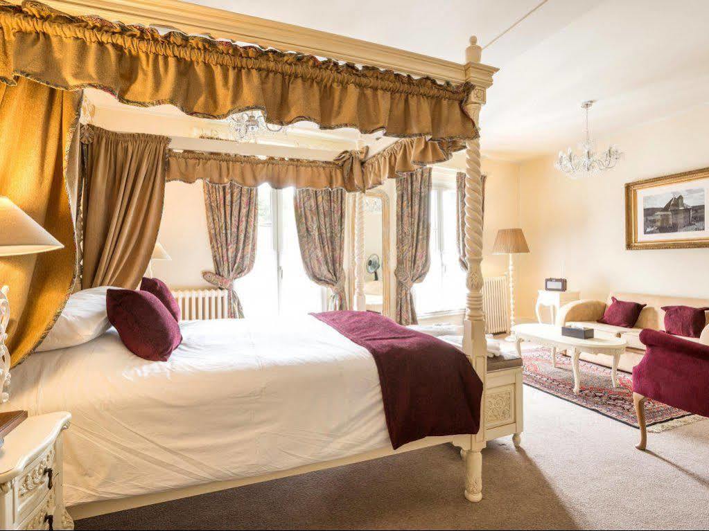 Logis Hotel De France La Chartre-sur-le-Loir Esterno foto