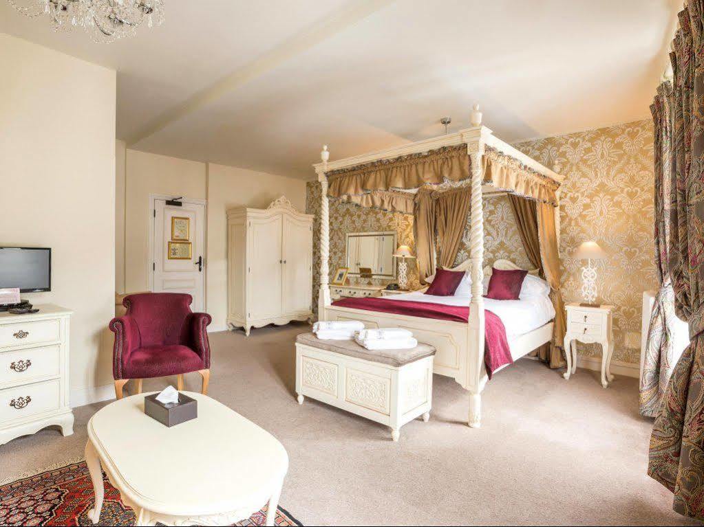 Logis Hotel De France La Chartre-sur-le-Loir Esterno foto